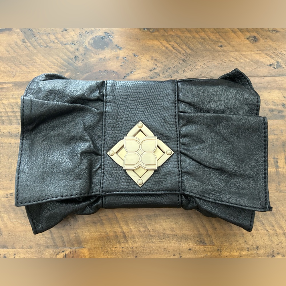 BCBGMaxAzria Bow Clutch in Black Leather